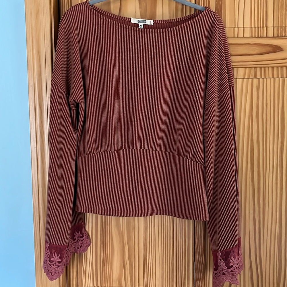 Burnt orange flutter sleeve top with lace detail